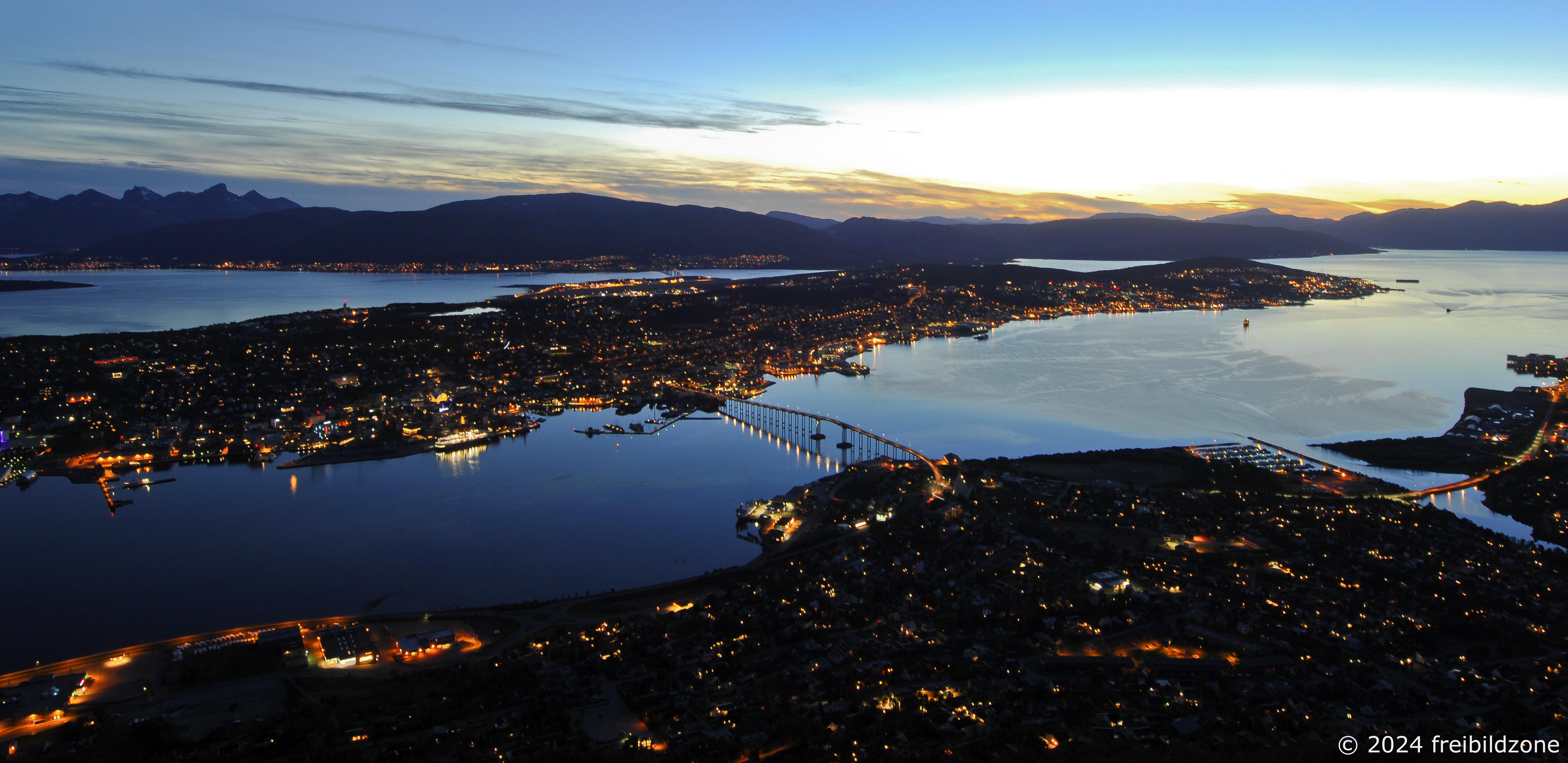 Tromsø at arctic midnight, breathtaking view from Fjellheisen