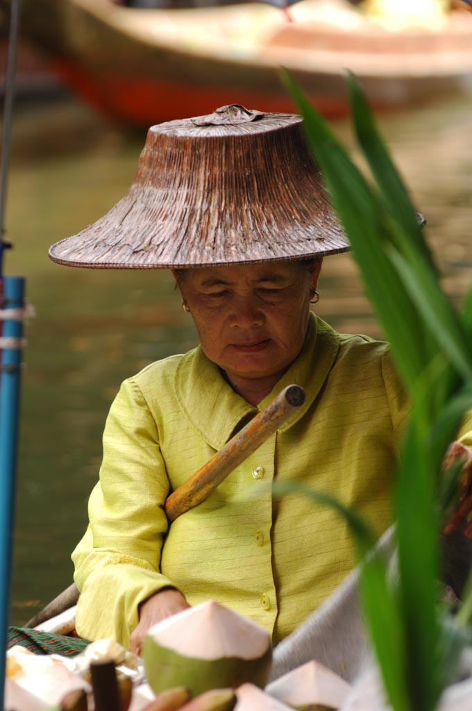 Woman on floating market, Damnoen Saduak, Thailand