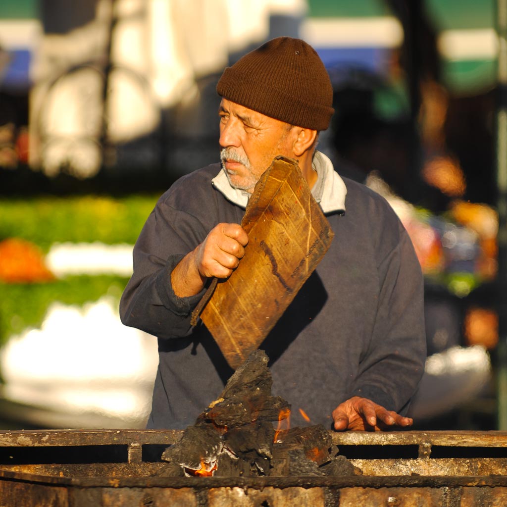 Merchant and cook at Jemaa el-Fnaa, Marrakesh, Morocco