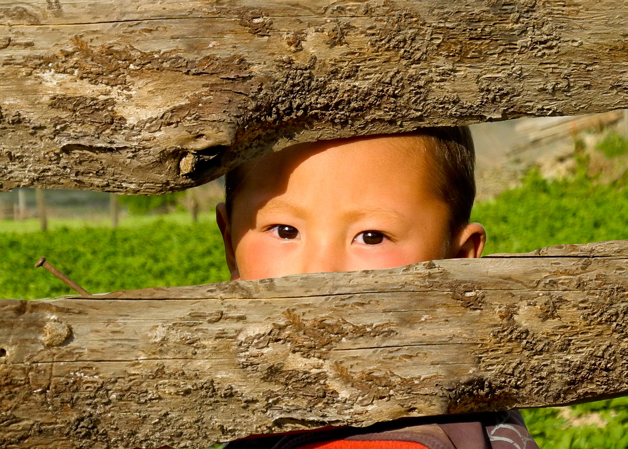 Curious young boy in Gangtey, Bhutan