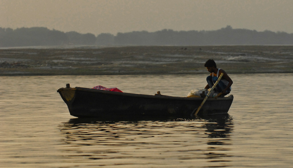 Fishing early in the morning on River Ganga, Varanasi, Uttar Pradesh