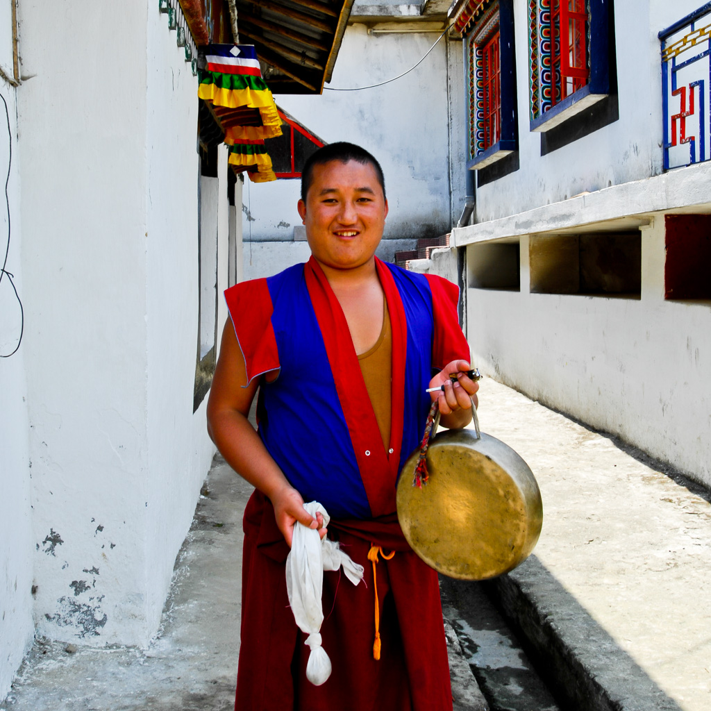Monk in small monastery near Ravangla, Sikkim, India
